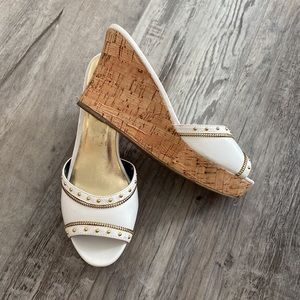 White wedge with gold metal accents